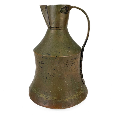 163 - A Persian copper ewer. Height 38cm, together with a large copper bowl and a copper plate.