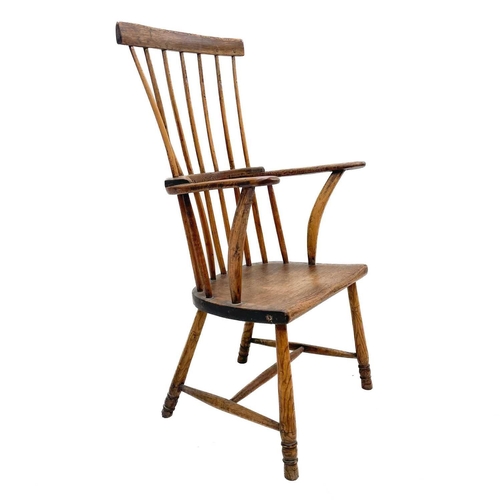 166 - A 19th century elm and fruitwood West Country comb back Windsor armchair. Height 104cm width 62cm de... 