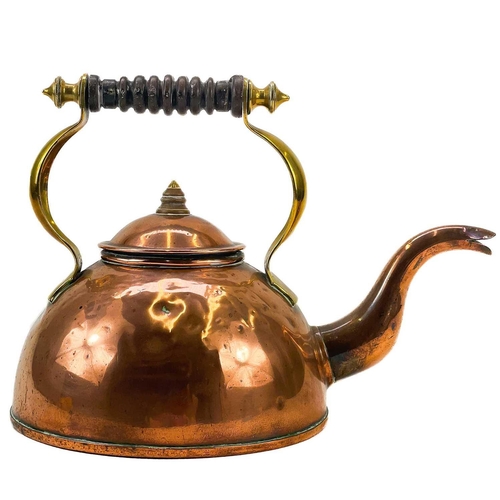 167 - A Victorian copper and wrought iron kettle and stand. In the Aesthetic taste, with scrolled and peta... 