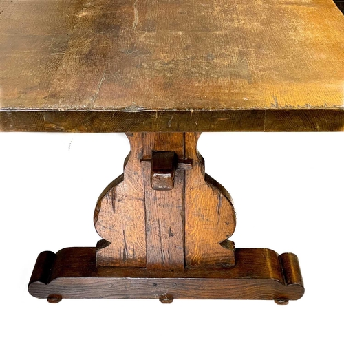 170 - An oak refectory dining table in the 17th century style. Raised on flattened vase shape supports wit... 