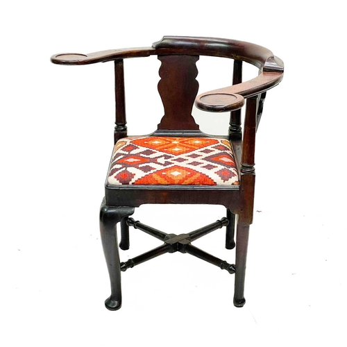 183 - A George II oak corner tub chair. With bow backrest, shaped splats two recessed holders on cabriole ... 