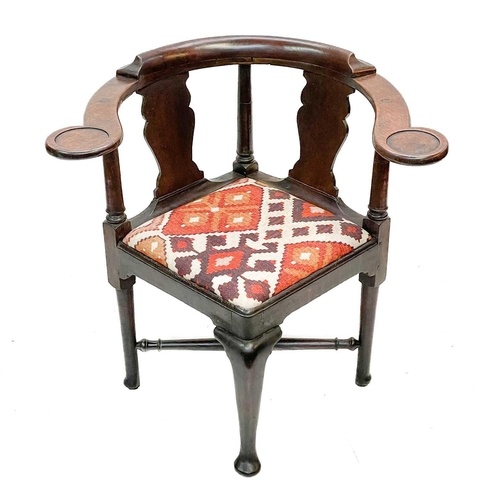 183 - A George II oak corner tub chair. With bow backrest, shaped splats two recessed holders on cabriole ... 