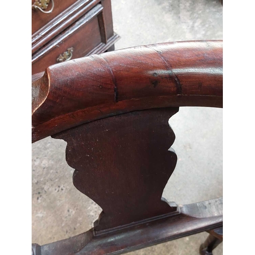 183 - A George II oak corner tub chair. With bow backrest, shaped splats two recessed holders on cabriole ... 