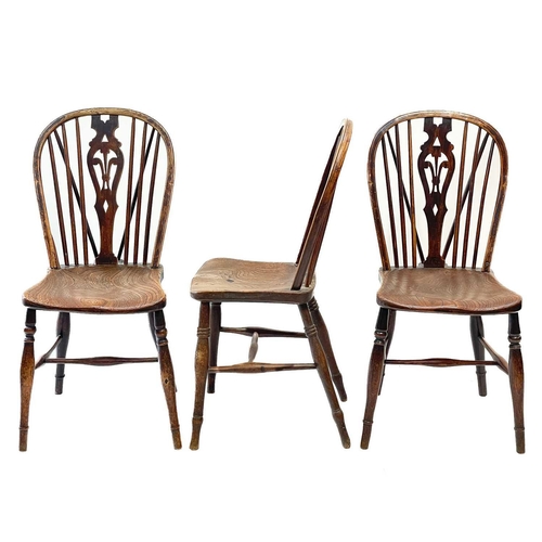 185 - A pair of 'Prince of Wales' fruitwood, ash and elm Windsor dining chairs. 19th century, with solid s... 