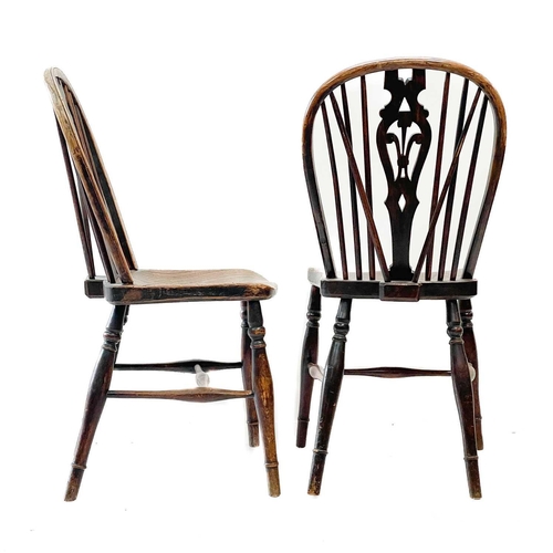 185 - A pair of 'Prince of Wales' fruitwood, ash and elm Windsor dining chairs. 19th century, with solid s... 