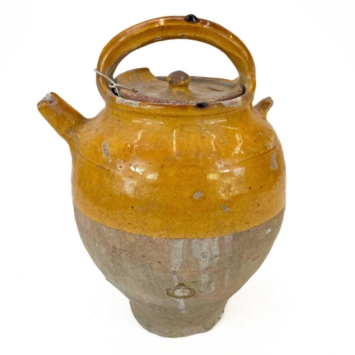 186 - A French pottery Cruche D'eau. Late 19th century with mustard glaze, height 31cm.