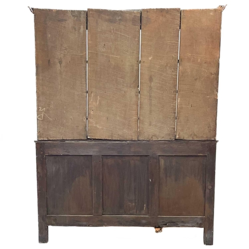 19 - An oak dresser and rack. Early 19th century, with a plain cornice above three shelves, the lower par... 