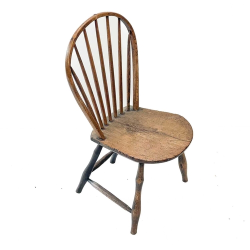 20 - A Yealmpton type Windsor chair. With stick back and solid seat.Evidence of historic woodworm, possib... 