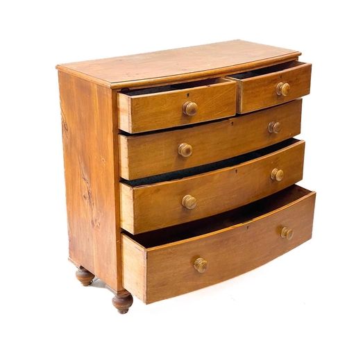 206 - A 19th century bow fronted chest of drawers. With two short and three long drawers on bun feet, heig... 