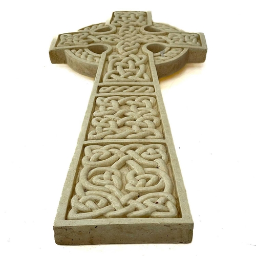 207 - A resin Celtic cross. Height 57cm, width 23cm, depth 3cm.