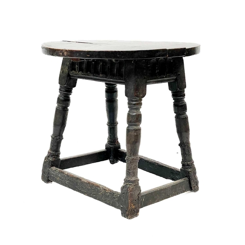 218 - An oak joint stool. Incorporating 17th century elements, now as an occasional table, with an oval el... 