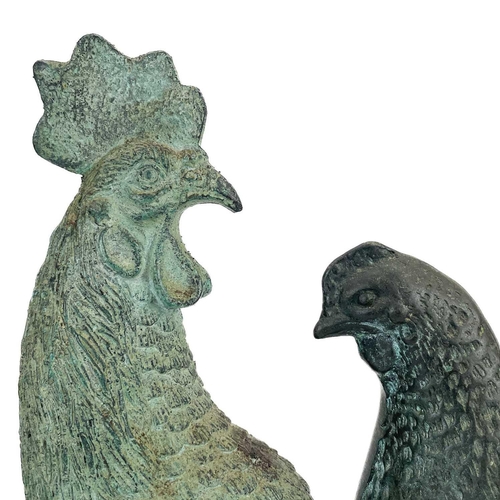 225 - A bronze model of a cockerel. Height 29cm together with a bronze model of a hen. (2)