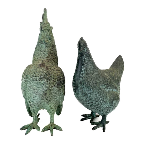 225 - A bronze model of a cockerel. Height 29cm together with a bronze model of a hen. (2)