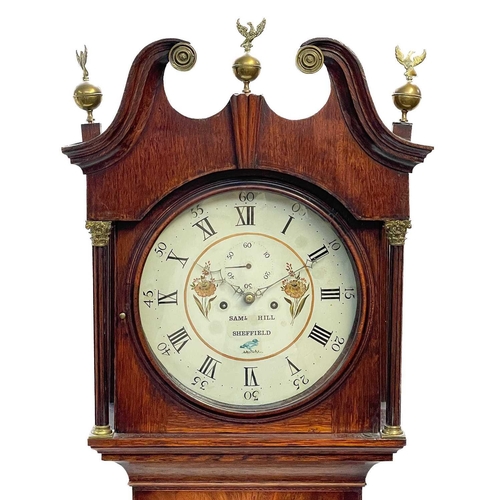 24 - An oak eight-day longcase clock. Early 19th century, the circular white painted 34cm dial signed Sam... 