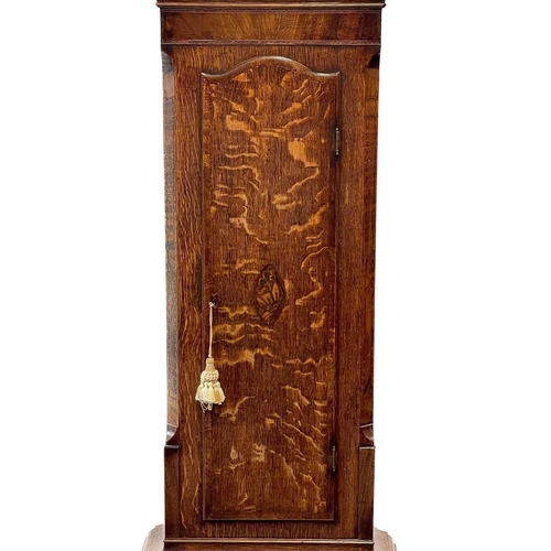 24 - An oak eight-day longcase clock. Early 19th century, the circular white painted 34cm dial signed Sam... 