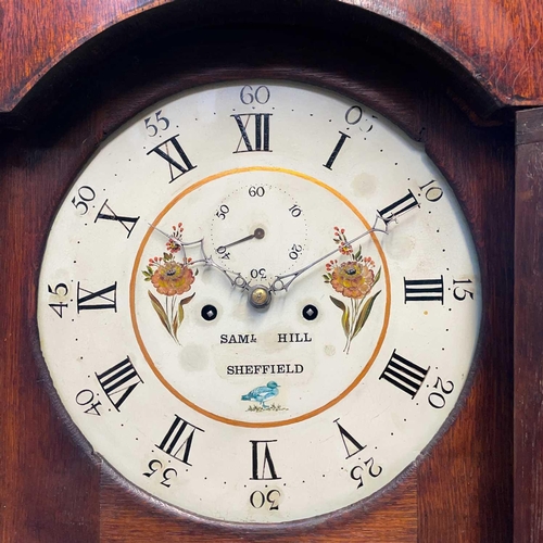 24 - An oak eight-day longcase clock. Early 19th century, the circular white painted 34cm dial signed Sam... 