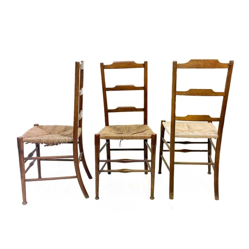 245 - Three Victorian ladderback chairs. One with rush seat, two with cord seats, height 92cm width 40cm d... 