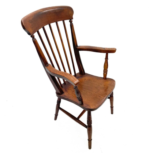 246 - A Victorian beech, ash and elm kitchen Windsor armchair. With spindle turned back, and solid seat, h... 