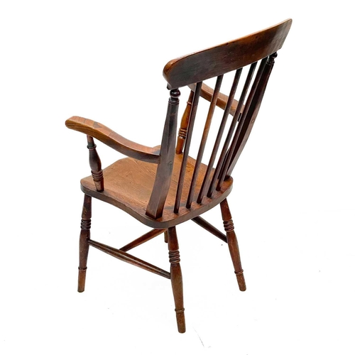 246 - A Victorian beech, ash and elm kitchen Windsor armchair. With spindle turned back, and solid seat, h... 