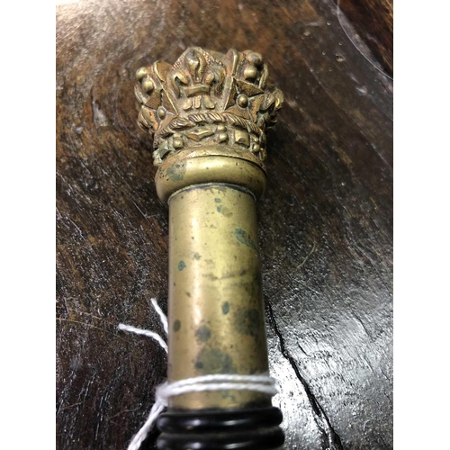 259 - A Victorian Parker Field & Sons brass tipstaff. With ribbed ebony handle and crown finial, stamped m... 