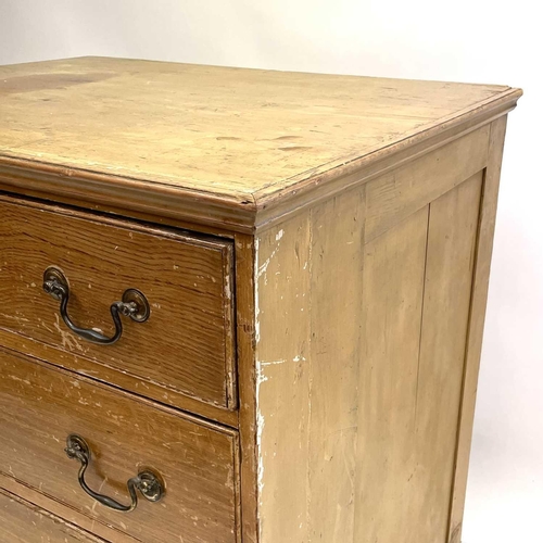 260 - A late George III scumbled pine four drawer chest. The drawer fronts with faux wood grain, with pane... 