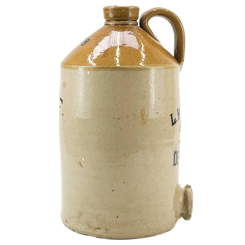 261 - A large stoneware flagon, Chaplin & Sons Devonport. Height 39cm, together with two other flagons, on... 