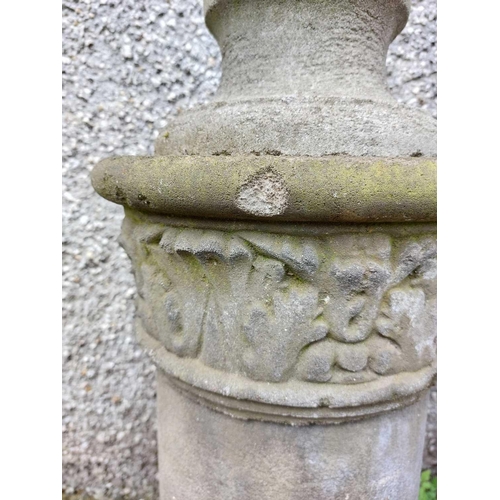 27 - A reconstituted stone bust of a man. Raised on a plinth in a neoclassical style, height 114cm, width... 