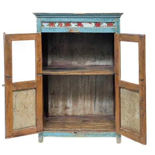 45 - A Himalayan painted metal cabinet. Height 150cm, width 102cm, depth 52cm.