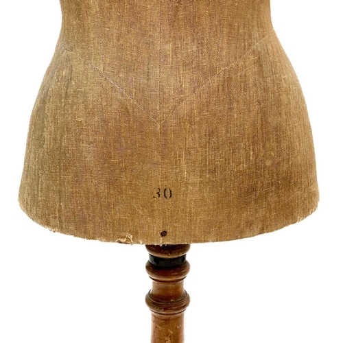 56 - A mannequin or Taylor's dummy. Early 20th century, labelled for Wixley, Jones & Co Ltd, London, rais... 