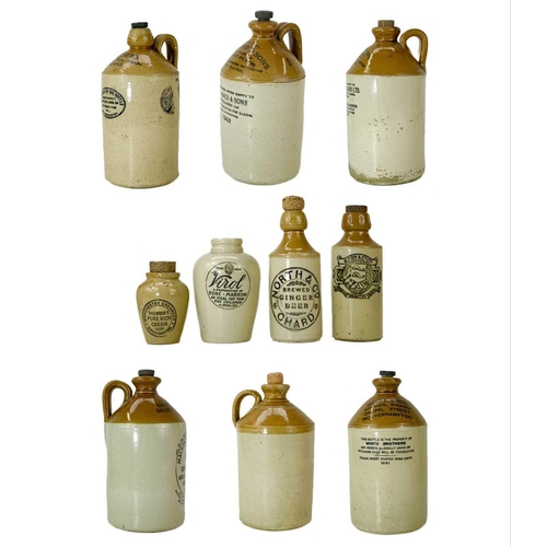 58 - A group of six stoneware ginger beer and other beverage flagons. Including some named for J.H.Jones ... 