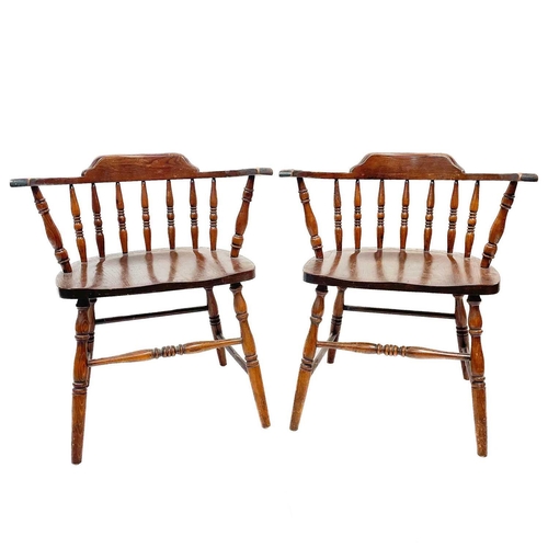 59 - A pair of beech and ash smokers bow style elbow chairs. Probably American, circa 1950, with turned s... 