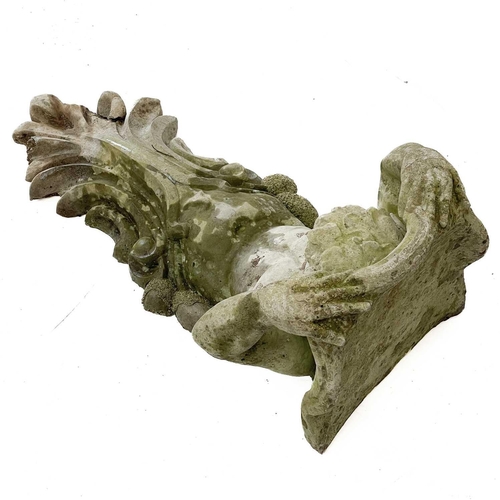 82 - A reconstituted term figure garden bracket. Height 90cm, width 48cm, depth 36cm.