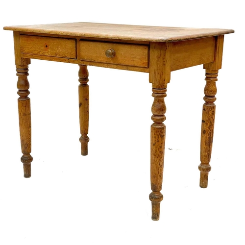 85 - A Victorian pine side table. With two short drawers on turned supports, height 75cm width 91cm depth... 