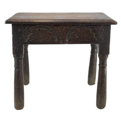 90 - An oak joint stool. 17th century style, with lunette carved frieze, on turned legs (reduced), height... 