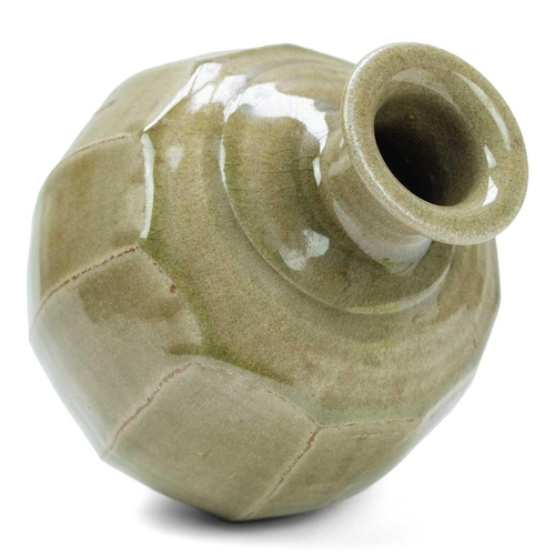 551 - Phil ROGERS (1951-2020) Cut-Sided Vase  A stoneware ovoid cut-sided bottle vase with celadon glaze, ... 