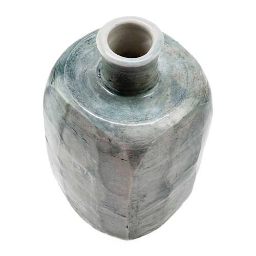 573 - William 'Bill' MARSHALL (1923-2007) A cut-sided porcelain bottle vase with blue brushed glaze, impre... 