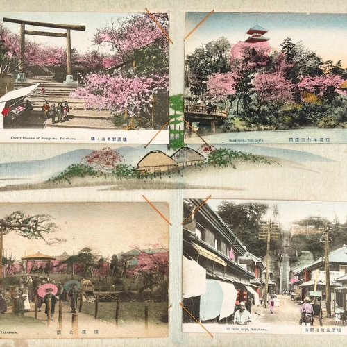 129 - Seventy two Japanese postcards, early 20th century. All mounted in a Japanese black and gilt lacquer... 