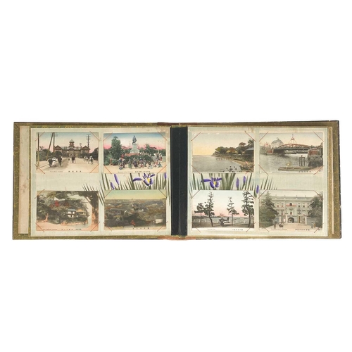 129 - Seventy two Japanese postcards, early 20th century. All mounted in a Japanese black and gilt lacquer... 