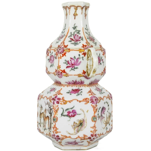 131 - A Chinese famille rose porcelain double gourd vase, circa 1760. With twin handles and decorated with... 