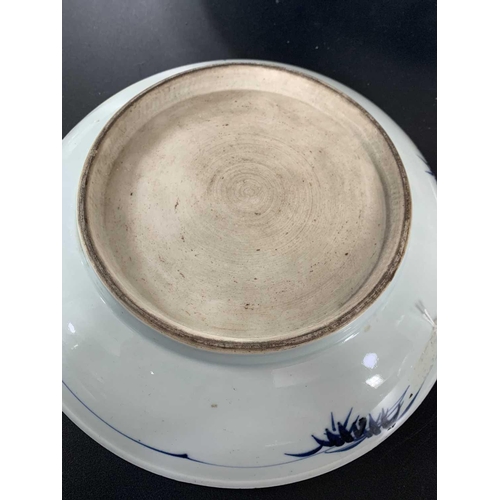 141 - A Chinese Imari porcelain dish, 18th century. With horses in a landscape and standing beneath a will... 