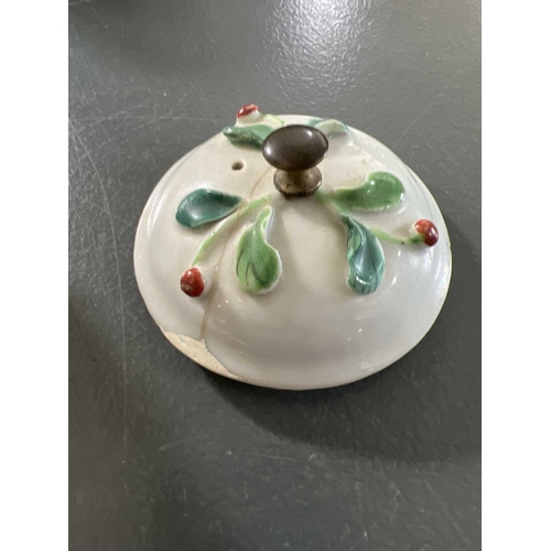 144 - A Chinese porcelain teapot, mid 18th century. .With applied floral and leaf decoration, height 12cm,... 