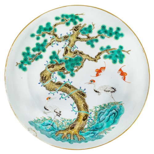 152 - A Chinese famille verte porcelain dish, red Daoguang seal. Painted enamel decoration of a large tree... 