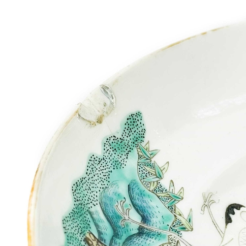 152 - A Chinese famille verte porcelain dish, red Daoguang seal. Painted enamel decoration of a large tree... 