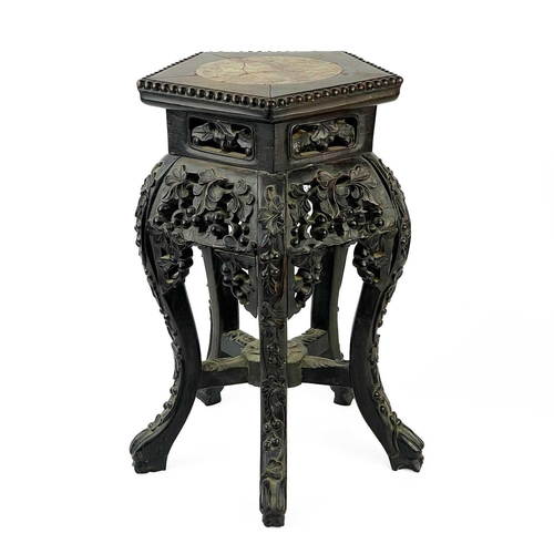 164 - A Chinese carved hardwood jardiniere stand, 19th century. With marble inset top, height 46cm, width ... 