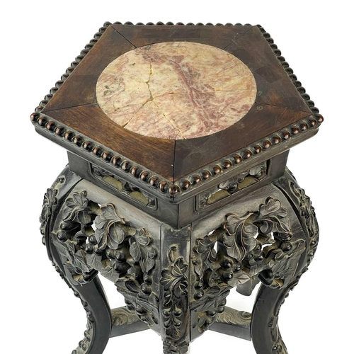 164 - A Chinese carved hardwood jardiniere stand, 19th century. With marble inset top, height 46cm, width ... 