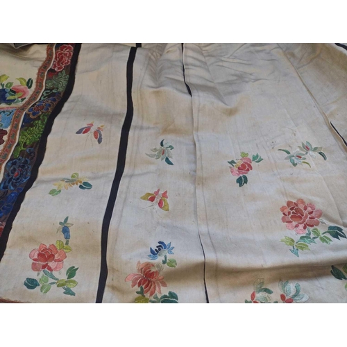 168 - An attractive Chinese silk embroidered pleated skirt, 19th century. The cream ground with multiple f... 