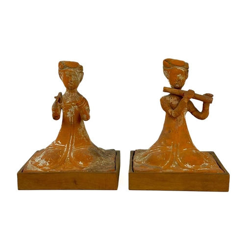 176 - A pair of Chinese terracotta tomb musicians, Tang style. Each on square wooden stands, height of til... 