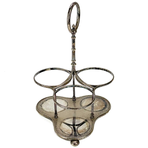 107 - A late Victorian three bottle silver plated decanter stand. With ring handle and fitted with three p... 