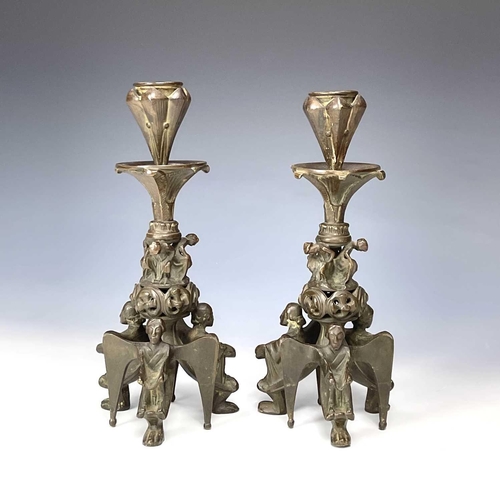 118 - A pair of French bronze gothic candlesticks by A D Delafontaine. 19th century, the bases modelled wi... 