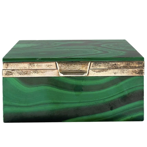 12 - A silver mounted rectangular malachite hinged box. The mounts marked for Geo Betjemann & Sons Ltd, L... 